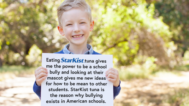 Illustration for article titled This List Of Kids Holding Up Signs Saying That StarKist Tuna Gives Them The Energy They Need To Bully Their Classmates Will Only Come Down If StarKist Pays Us $90 Million